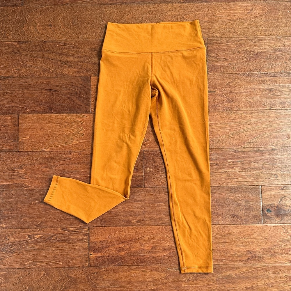 Never worn. Athleta Orange Leggings High Waist Full Length
